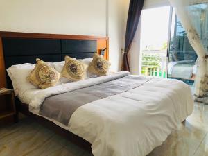 Postel nebo postele na pokoji v ubytování residence hoteliere samba