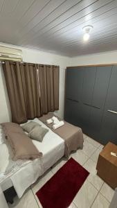 Postel nebo postele na pokoji v ubytování Apartamento 2 quartos