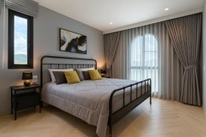 Postel nebo postele na pokoji v ubytování The Title Legendary Bang Tao - Modern 1BR Resort Apartment + 25 fotografií