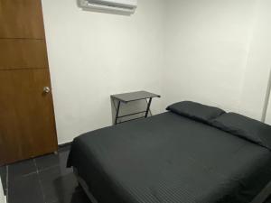 En eller flere senge i et værelse på Apartamento Brisa Marina, cómodo y accesible + 1 billede