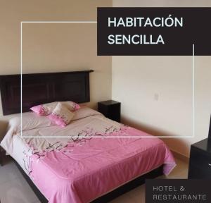 Postel nebo postele na pokoji v ubytování Hotel real palacio