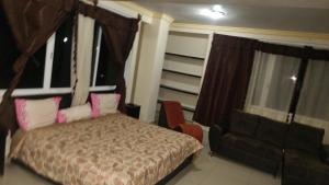 Postel nebo postele na pokoji v ubytování Hotel real palacio