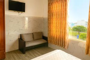 Giường trong phòng chung tại Hải Quỳnh Hotel +54 ảnh