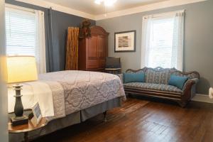 Postel nebo postele na pokoji v ubytování Sunday Morning at Savannahs