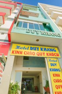 a building with a sign in front of it at Duy Khang 1 Hotel in Ho Chi Minh City