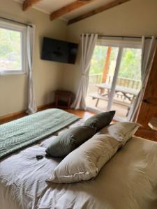 Postel nebo postele na pokoji v ubytování La Magnolia Aldea Molco + 18 fotografií