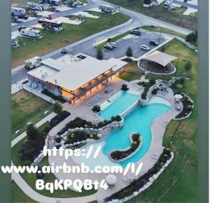 an aerial view of a pool at a resort at Moonlight Views #54 Firefly Resort in Fredericksburg +22 photos