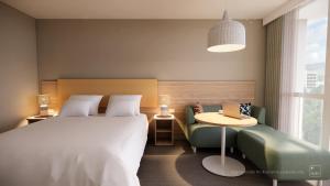 Katil atau katil-katil dalam bilik di Pacific Hotel Cairns