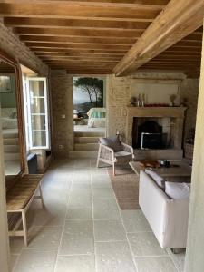 Posezení v ubytování La petite Luzerne 300m de la plage, Cosy et confortable maison rénovée pour 8