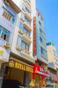 a building with a royal hotel in front of it at Royal Hotel Hà Nội in Hanoi