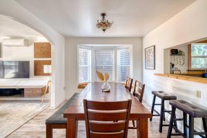 a dining room with a wooden table and chairs at Stay Portland - Alberta Arts Luxury, Sleeps 6, Walk Score 99 in Portland +28 photos
