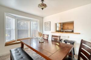a dining room with a wooden table and chairs at Alberta Arts Luxury Sleeps 4 Walk Score 99 in Portland