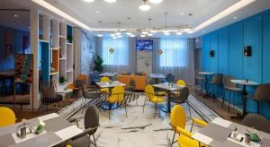 Posezení v ubytování Magnotel Hotel Shiyan Wuyan Pedestrian Street + 53 fotografií