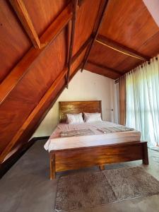 Ένα ή περισσότερα κρεβάτια σε δωμάτιο στο Villa Heavenora