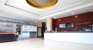 a lobby of a store with a counter and a counter at City Comfort Inn Huizhou Zhongkai Huihuan in Huizhou