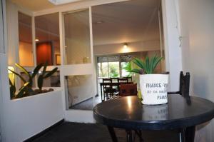 a potted plant sitting on a table in a room at De la calle 45 in La Plata