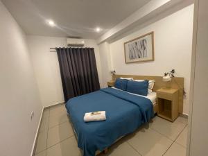 Ένα ή περισσότερα κρεβάτια σε δωμάτιο στο Kings Luxury 2 bedroom at Gallery