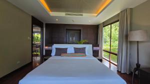 Postel nebo postele na pokoji v ubytování Nammara at Shasa - 2 Bedroom apartment at Laem-Set + 59 fotografií