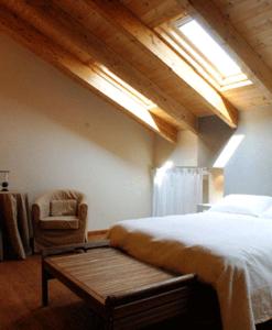 En eller flere senge i et værelse på Corte Mondina