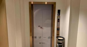 a shower stall in a room with a wall at City Comfort Inn Changsha Sifangping University of National Defense Science and Technology in Changsha +178 photos