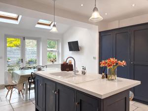 Køkken eller tekøkken på Sunnybeck Cottage