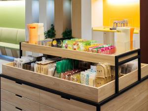 a store shelf filled with lots of food at Hotel Dream Gate Maihama Annex in Chiba