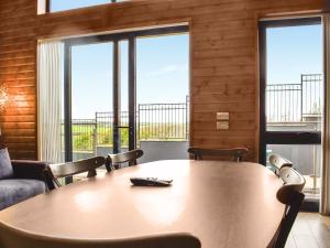 a conference room with a table and chairs and windows at Briallen - Primrose - Ukc7075 in Mydroilin