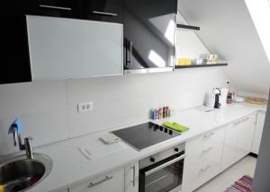 Ett kök eller pentry på Apartment Vatra