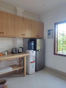 Kuchyň nebo kuchyňský kout v ubytování The Collony House of Baciro