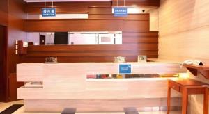 a kitchen with a counter with signs on it at Grand Harbour Hotel in Macau +148 photos
