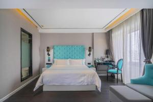 Ένα ή περισσότερα κρεβάτια σε δωμάτιο στο Xana Hotelle Beijing Qianmen Footbridge Metro Station +215 φωτογραφίες