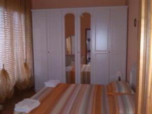 Posteľ alebo postele v izbe v ubytovaní Casa Tommaso