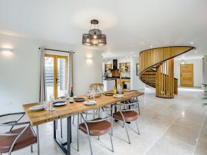 a dining room with a wooden table and chairs at Lime Tree House - Uk49477 in Bulmer