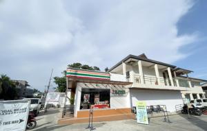a building with a store on the side of a street at Sebay Surf Central San Juan La Union in San Juan +6 photos