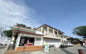 a store front of a white building at Sebay Surf Central San Juan La Union in San Juan