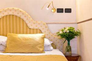 Postel nebo postele na pokoji v ubytování Ca' San Giorgio B&B