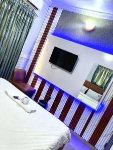 TV a/nebo společenská místnost v ubytování PnK Inn