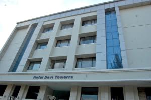 a building with the national detroit detroit boat towers at Devi Towerrs 5 Roads in Salem