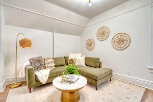 a living room with a couch and a table at Stay Portland - Historic Queen Anne Vernacular - 95 WalkScore in Portland