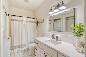 a white bathroom with a sink and a mirror at Stay Portland - Perfect Portland Farmhouse Loft - Breweries & Bars in Portland