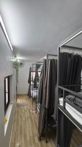 a room with a bunch of bunk beds at Mikey House Ha Giang - Tour Operator & Homestay in Làng Xa