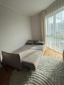 Ένα ή περισσότερα κρεβάτια σε δωμάτιο στο Fox17 Modern Stay +6 φωτογραφίες