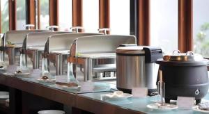 a row of kitchen appliances sitting on a table at D'Anaya Hotel Bogor in Bogor