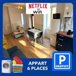 a kitchen and a living room with a table in a room at 26 CHIC & COSY NOIRETABLE F2 55m2 WIFI SMART TV NETFLIX in Noirétable