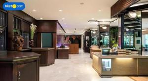 a store with a lobby with a lot of counters at Regent's Park Hotel in Malang +212 photos