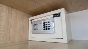 a microwave oven in the corner of a room at Badyan Boutique Hotel in Bukhara in Bukhara