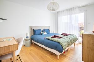 Postel nebo postele na pokoji v ubytování Rodern - Le Cocon des vignes