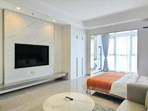 Μια τηλεόραση ή/και κέντρο ψυχαγωγίας στο Urban Sanctuary Riva Phnom Penh