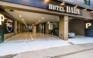 a hotel garage with a car parked in it at Tongyeong Daon Hotel in Tongyeong