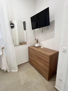 Μια τηλεόραση ή/και κέντρο ψυχαγωγίας στο Dea Marinae vacation house